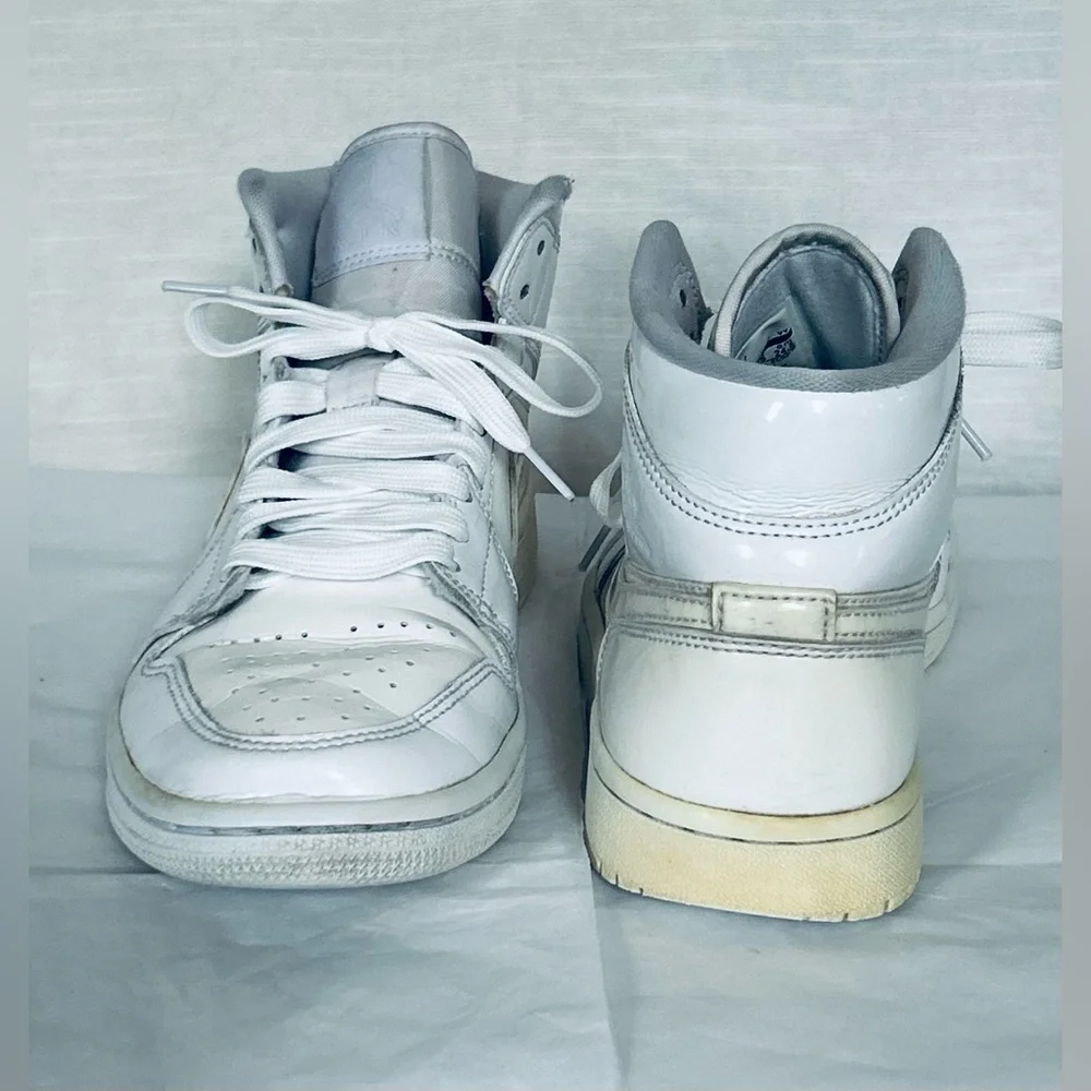 Nike Air Jordan Retro 1 Triple White Patent Leather High-Top Sneakers